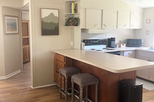 Fully Equipped Kitchen with Electric Oven, Microwave, Fridge and Keurig Coffee