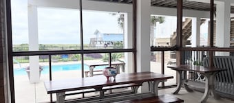 Beach front view. Golf Cart Friendly. Pool. Elevator.