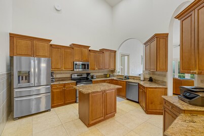 Waterfront home/ steps to the beach/ private dock/ heated pool/spa