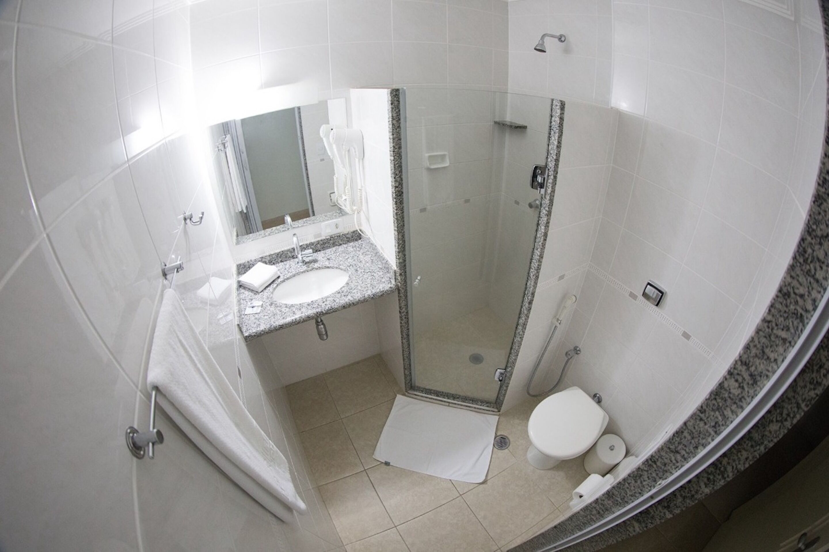 hair dryer, towels, toilet paper