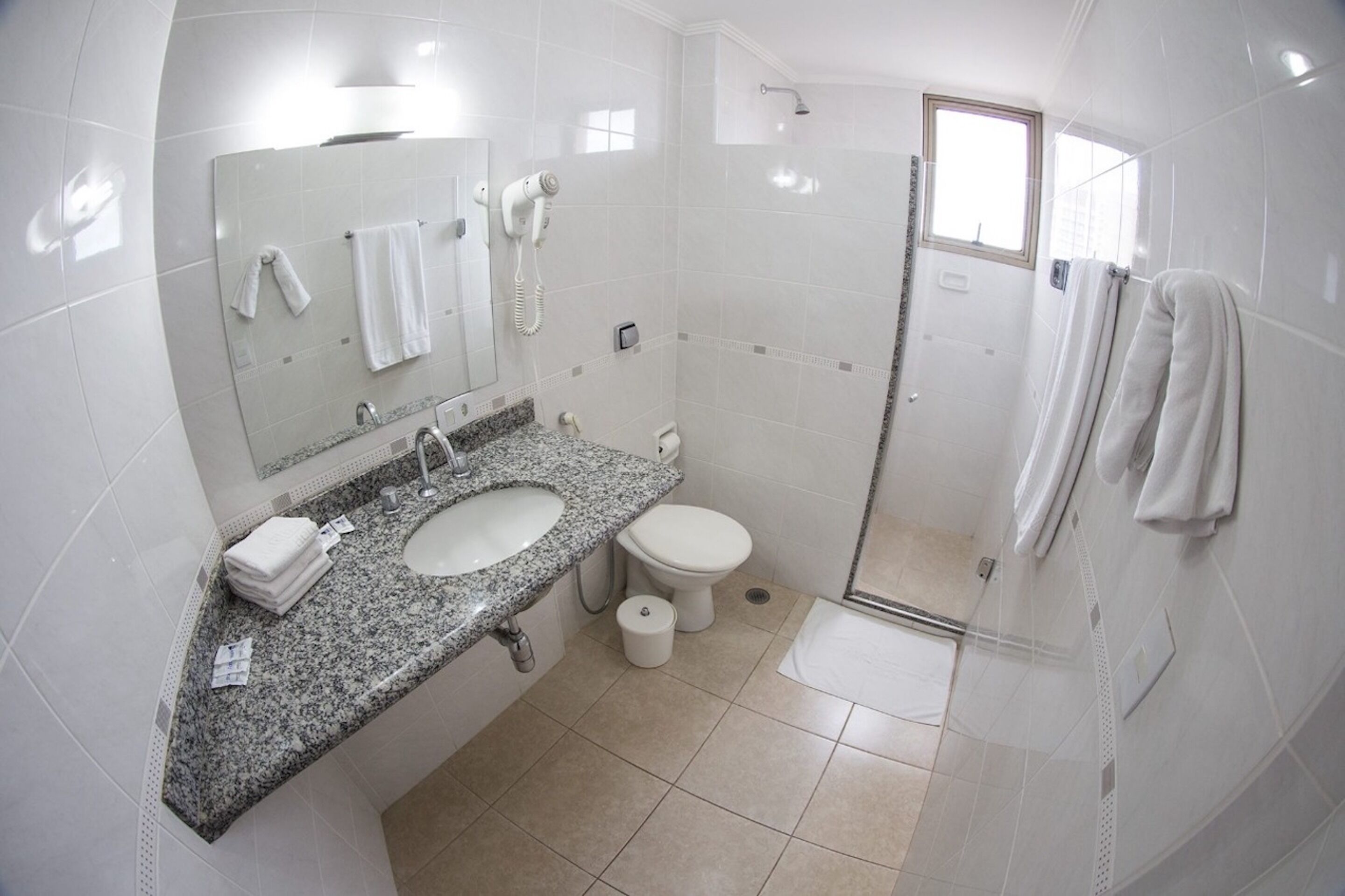 family room | bathroom | hair dryer, towels, toilet paper
