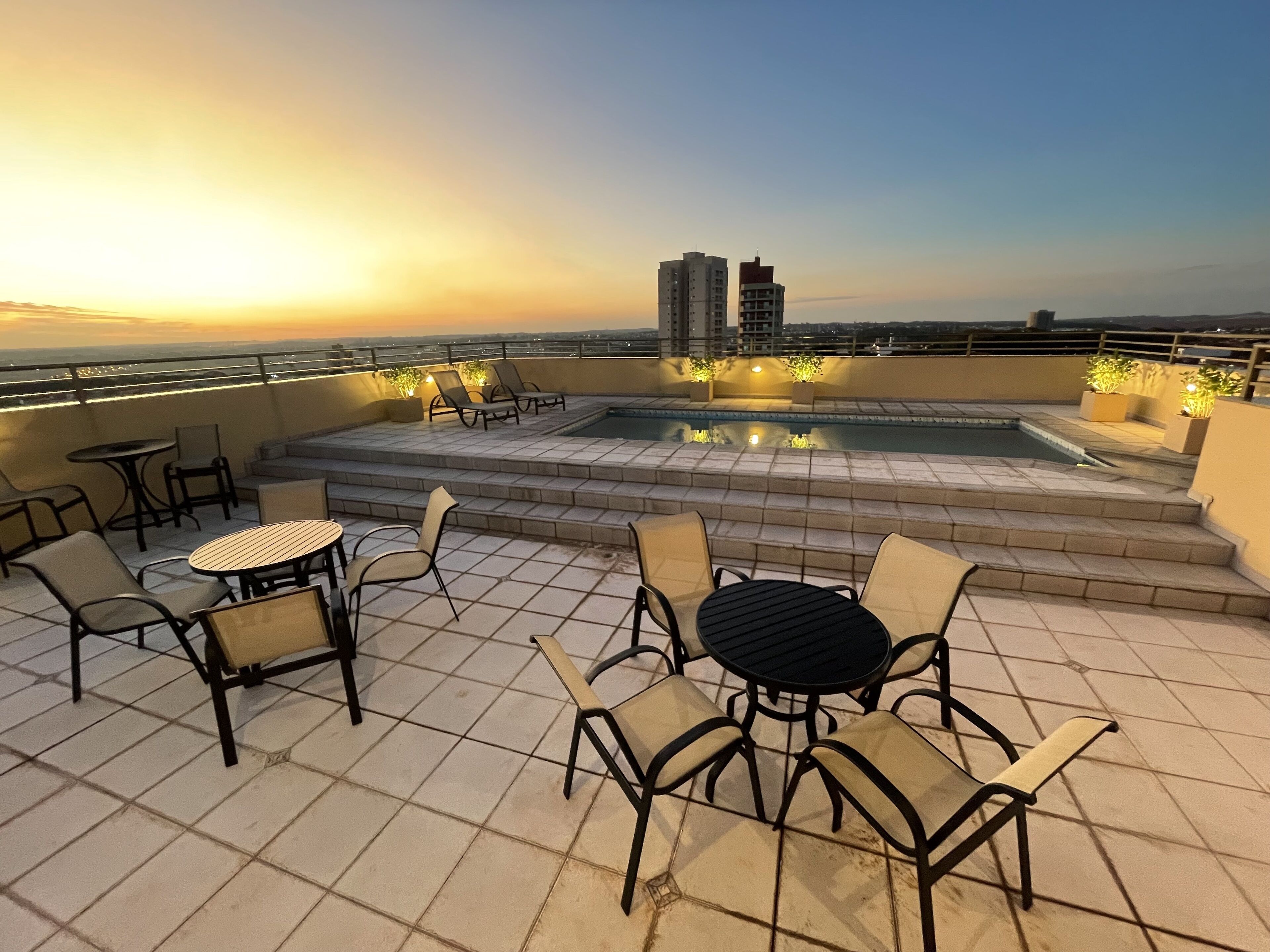 outdoor pool, open 10:00 am to 7:00 pm, pool loungers