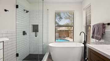Combined shower/tub, hair dryer, towels, soap