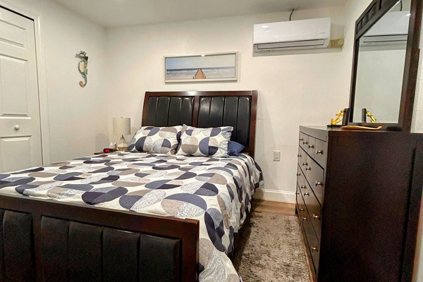Private room with a 43" Smart TV, a spacious closet, and a comfortable queen bed