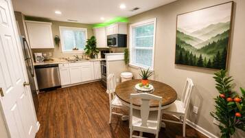 Coffee/tea maker, fridge, microwave, oven