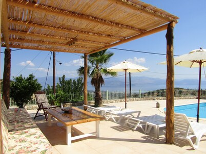 Stone house with pool and view to the sea
