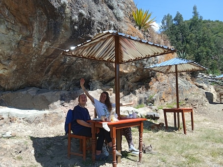 Outdoor dining. cozy room surrounded by nature and mountains