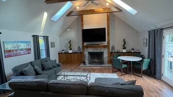 Smart TV, DVD player, foosball, video library