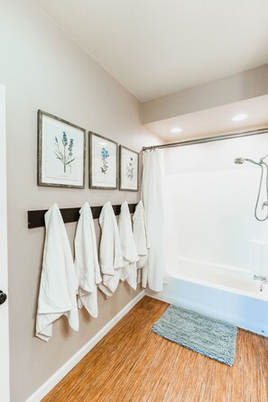 Combined shower/tub, hair dryer, towels, soap