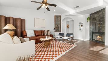 Smart TV, fireplace, foosball, books