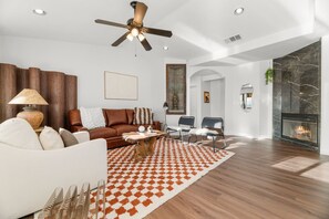 Smart TV, fireplace, foosball, books