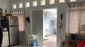 A compact living space with a kitchenette, a dining area, and a bedroom. - Romantic Zone 5 Blocks From the Beach (Puerto Vallarta)