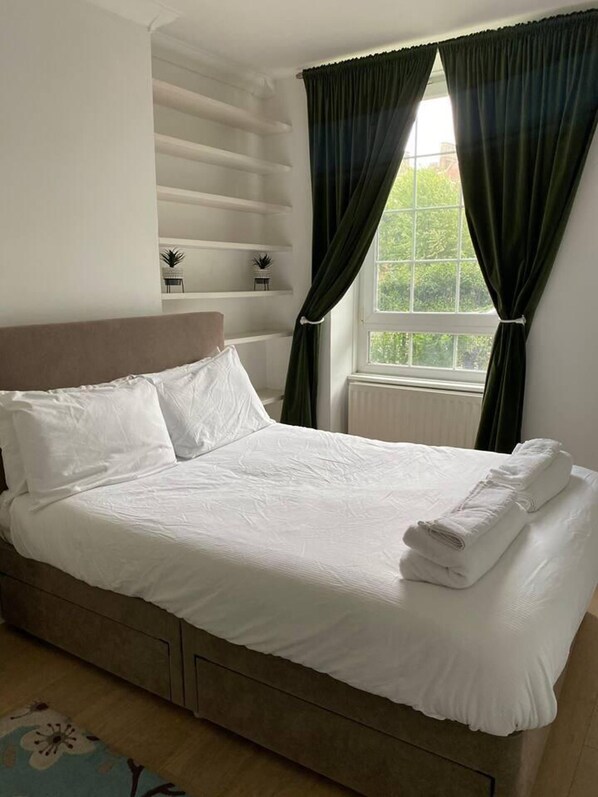 Appartement | 1 chambre, fer et planche à repasser, lit de bébé portatif