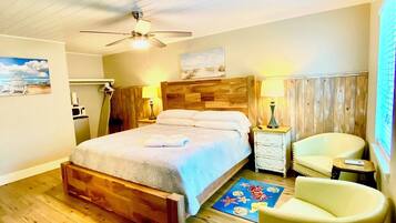 Tabla de planchar con plancha, wifi gratis y ropa de cama