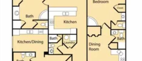 A floor plan of a house with a master bedroom, living/dining room, kitchen, and two bedrooms.