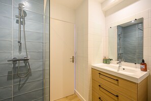 Hair dryer, towels, soap, shampoo