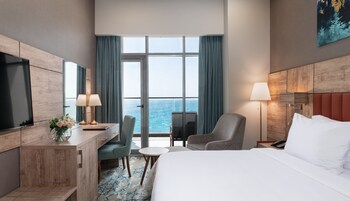 Premium Single Room, Sea View | Minibar, desk, soundproofing, iron/ironing board