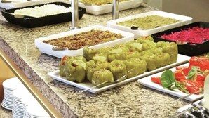 A buffet with various dishes including rice, meat, and vegetables. - Astoria Life Hotel (Marmaris)