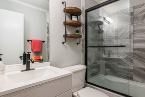 Shower, hair dryer, towels, soap