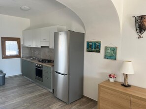 Fridge, microwave, oven, stovetop - Brand new apartment La Funtanedda Canniggione  (Cannigione)