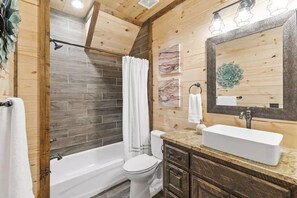 Combined shower/tub, towels, soap, toilet paper