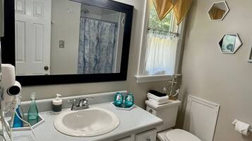 Combined shower/tub, hair dryer, towels, soap