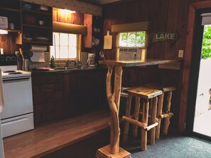 Fridge, microwave, oven, stovetop - The Sunfish - Historic Early 1900s 1-Bedroom  Log Cabin (Hines)