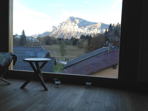 chalet entirely in wood near the center and near the forest