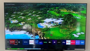 A television displaying a golf course with a view of the ocean and a modern house. - Beach House, 4 Blocks to Ocean/Bay+ BBQ & Firepit! (San Diego)