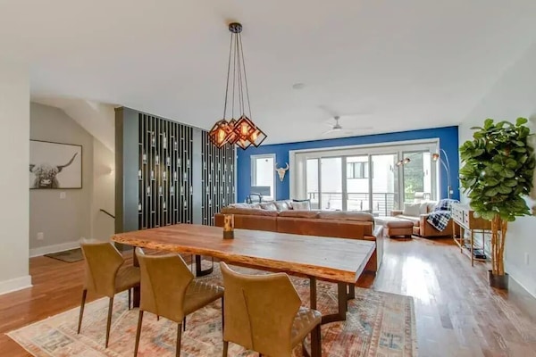 Beautiful 96" real wood dining table.  Hardwood floors throughout the home.