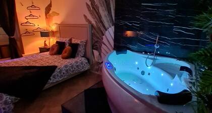 Spa, sauna, ciel de pluie tropicale, bouteille offerte, nuit romantique