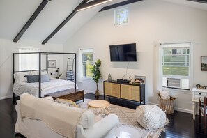 1 bedroom, desk, iron/ironing board, travel crib