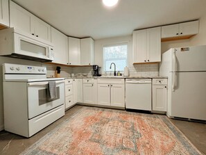 Fridge, microwave, oven, stovetop - Steps from Mountain View Cafe! 2 bedroom attached  cabin w/fenced private yard! (Colorado Springs)