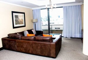 Exclusive Single Room, 1 King Bed with Sofa bed, City View | Living area - Luxury apartment in Raphael penthouse suite (Sandton)