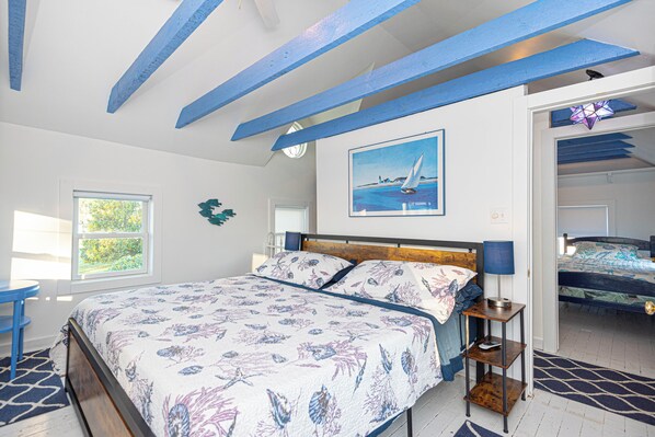 A king size bed adorns the master bedroom.