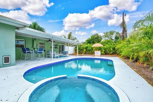 Your backyard oasis awaits...total privacy with a heated pool and hot tub.