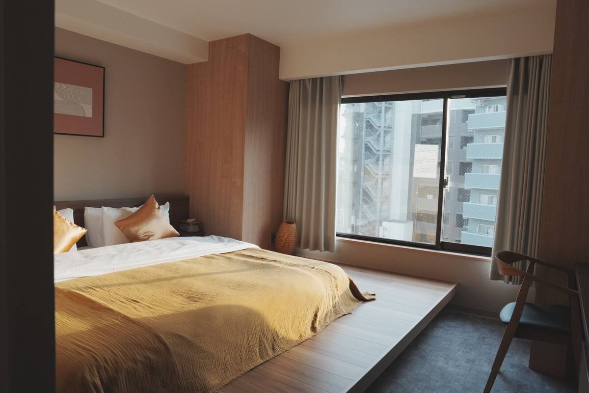 Chambre Deluxe avec lits jumeaux | Couette en duvet d'oie, Wi-Fi gratuit, draps fournis