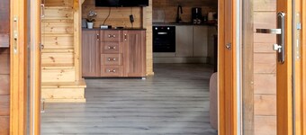 A modern house with a large garden and a place for relaxation + fun for children