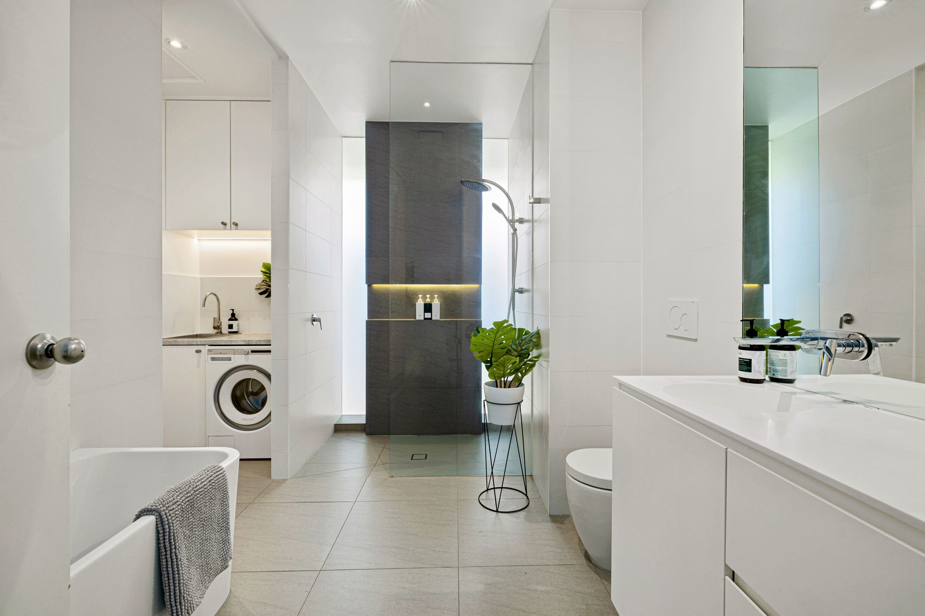 Bathtub, eco-friendly toiletries, hair dryer, towels