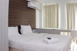 Studio | Free WiFi, bed sheets - Great Location Studio Room At Patraland Urbano Apartment (Bekasi)