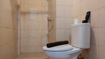 Apartment, 2 Bedrooms | Bathroom | Shower, free toiletries, towels, soap