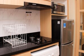 Studio | Cuisine privée | Réfrigérateur, surface de cuisson, vaisselle et ustensiles