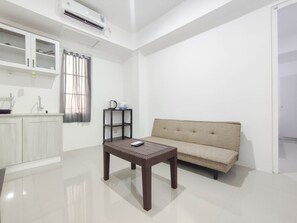 Apartamento | Área de estar | TV