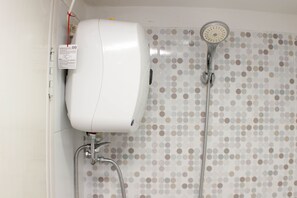 Studio | Bathroom - Cozy And Simply Studio At Grand Sentraland Karawang Apartment (Karawang)