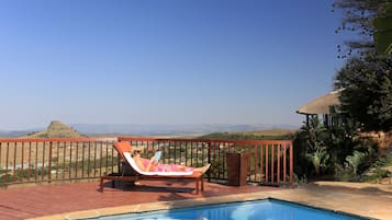 Outdoor pool, pool umbrellas, pool loungers