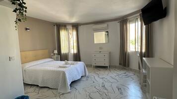 Twin Room | Down comforters, minibar, desk, laptop workspace