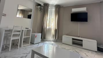 Family Apartment | Living area | Flat-screen TV