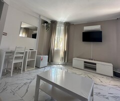 Family Apartment | Living area | Flat-screen TV