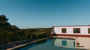 Outdoor pool, pool umbrellas, pool loungers