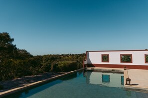 Outdoor pool, pool umbrellas, pool loungers